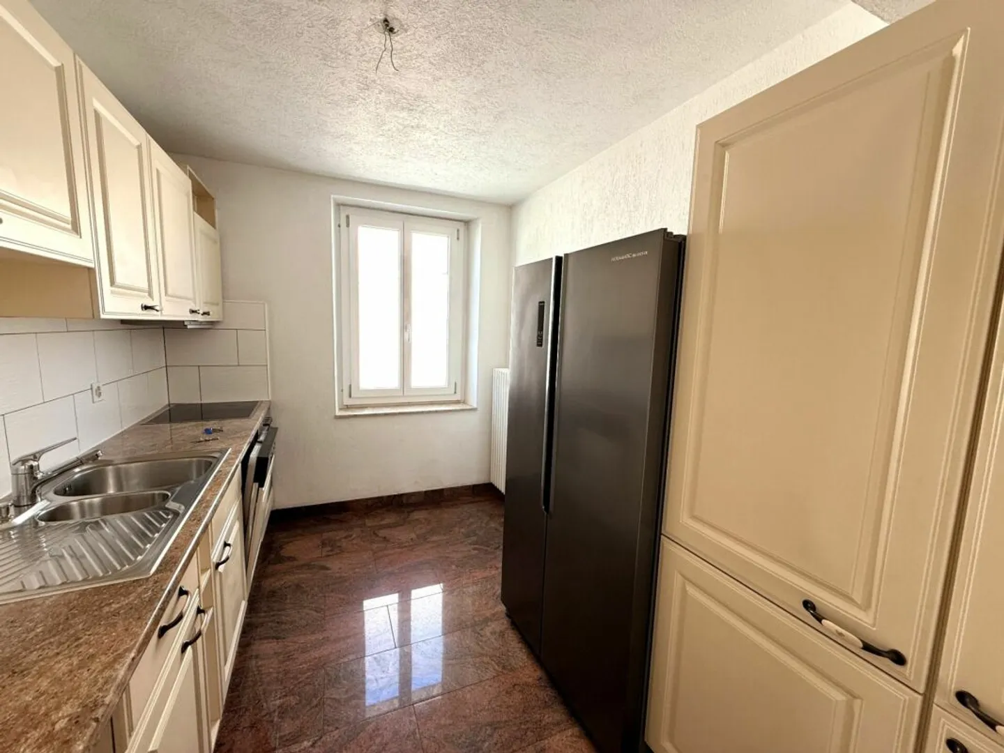 Multi-family house with 4 residential units in a central location in Bellach - Photo 9 of 13
