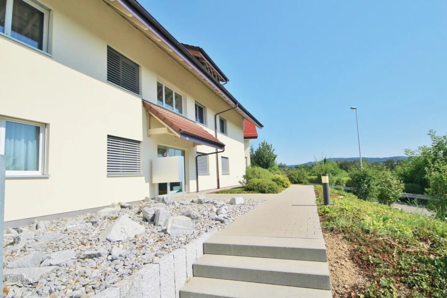 Charmant Appartement avec Jardin à Birrhard - Photo 2 sur 13