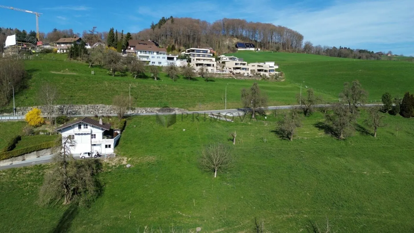 Where the world is still in order: Modern 2-family house embedded in picturesque landscape! - Photo 3 of 6