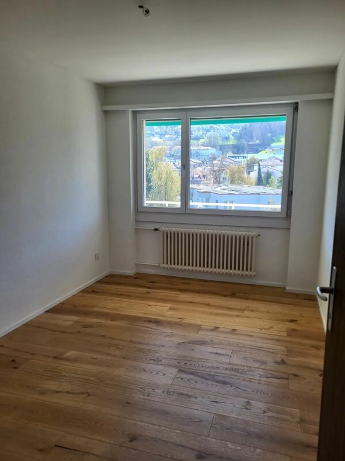 Appartamento all'ultimo piano con terrazza sul tetto e vista sul lago - Foto 11 di 12