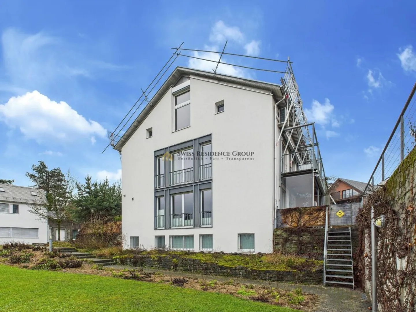 High-quality family residence with garden and unobstructed view of Lake Greifen - Photo 1 of 13