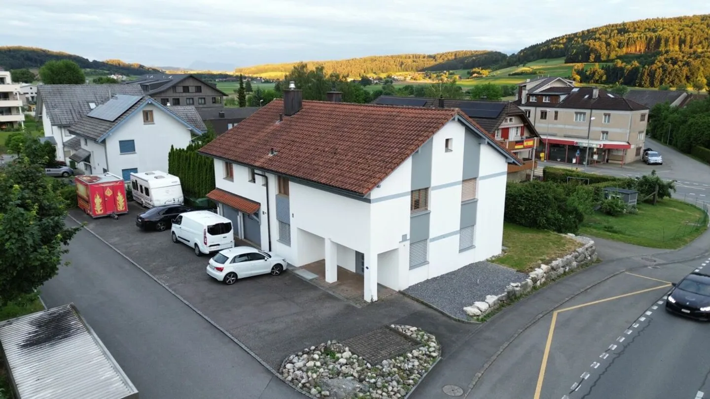 Einfamilienhaus mit Einliegerwohnung & Werkstatt - Foto 2 von 5