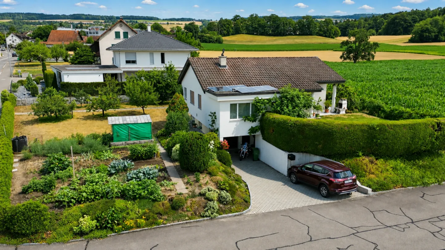 Charming 5.5 Room Single-Family House with Alpine View and Dream Garden - Photo 1 of 13