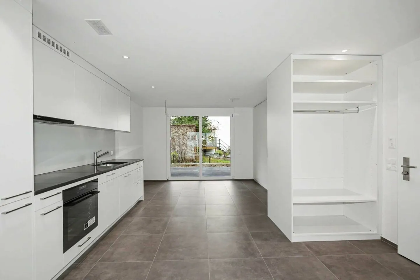 Moderne 1-Zimmerwohnung mit Garten - Foto 2 von 6