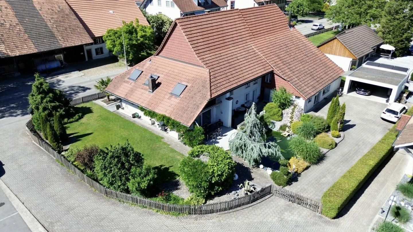 Unique property with commercial space, garden paradise, and expansion potential - Photo 1 of 13