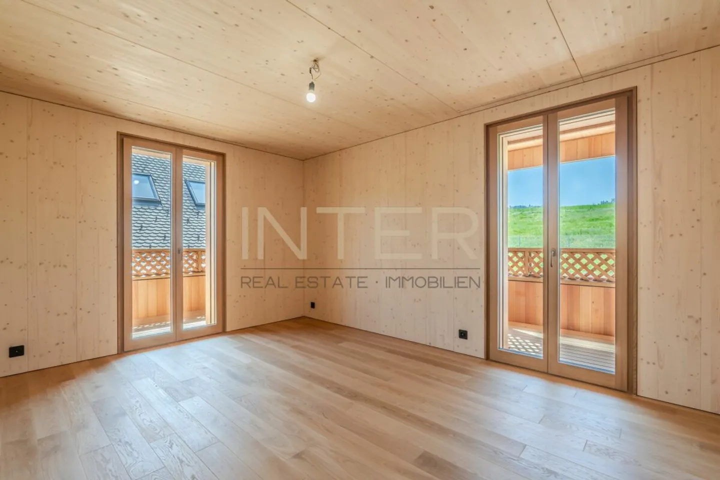 First occupancy in Risch: Exclusive 3.5-room apartment on the 2nd floor with 3 loggias and fireplace - Photo 6 of 13
