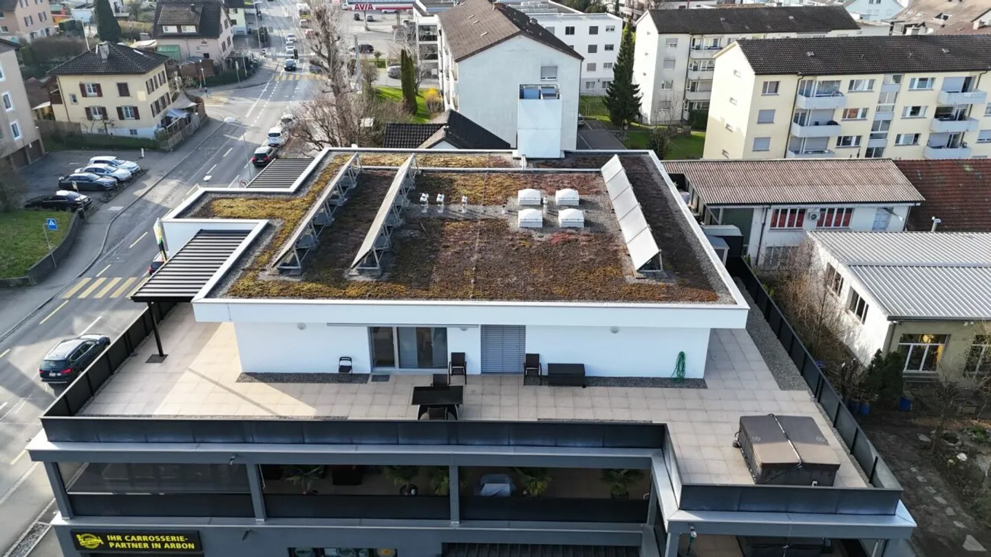 Above the rooftops of Arbon: Penthouse apartment with sunny roof terrace and lake view - Photo 2 of 13