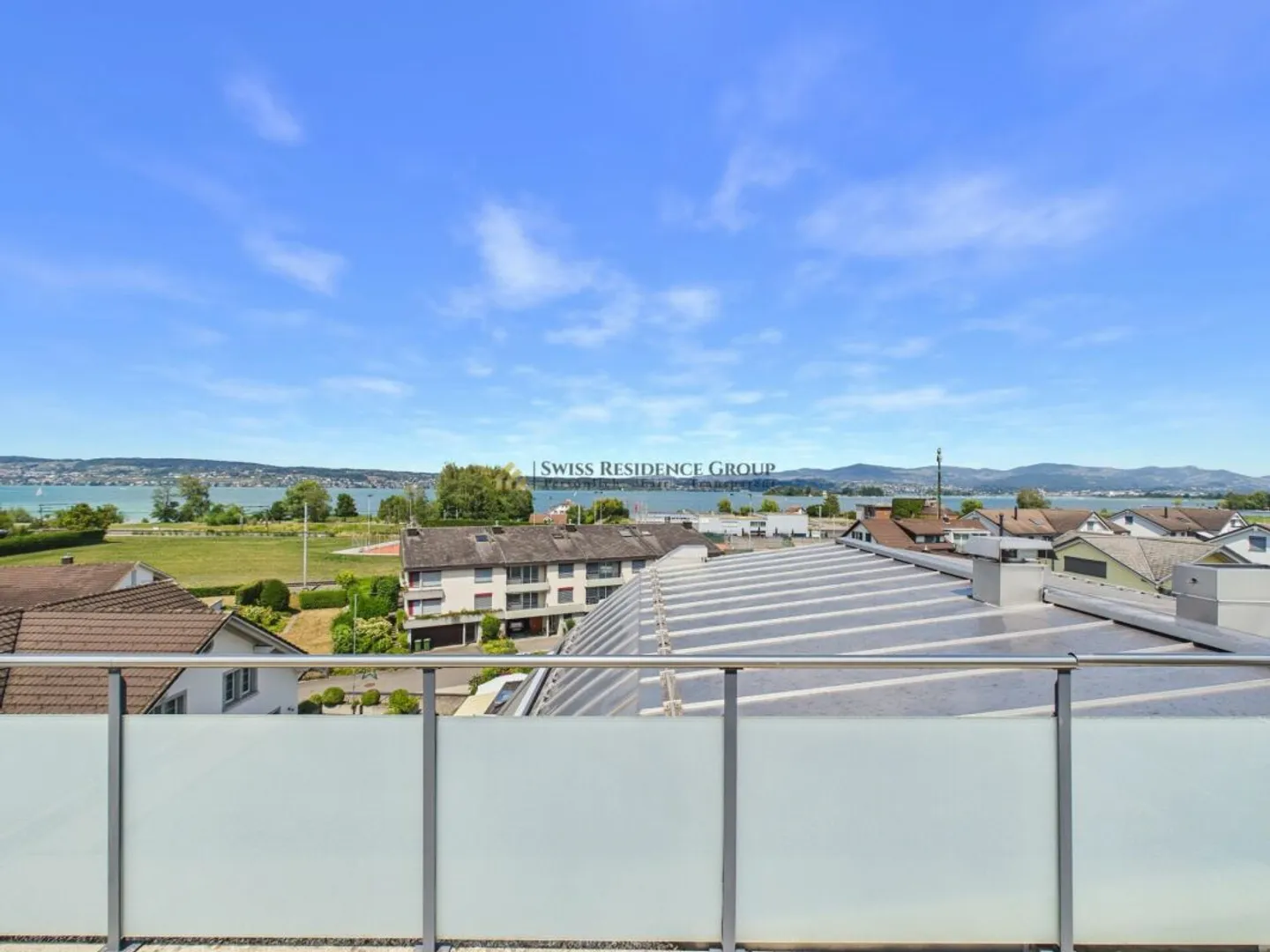 Exclusive with breathtaking lake view - private rooftop terrace - wellness oasis - Photo 1 of 13