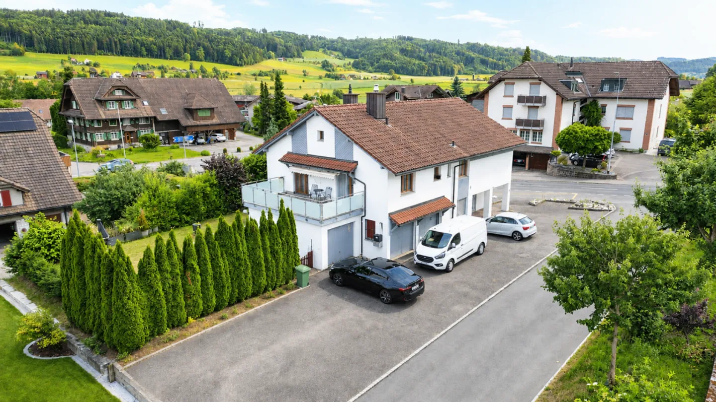 Einfamilienhaus mit Einliegerwohnung & Werkstatt - Foto 2 von 5