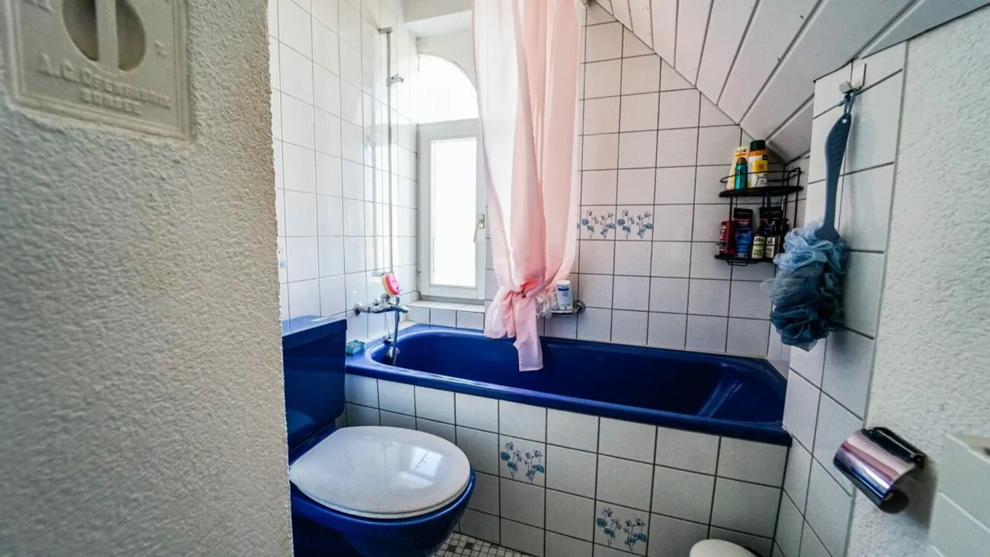 Charmantes Mehrfamilienhaus mit 8 Einheiten an zentraler Lage - Foto 9 von 11