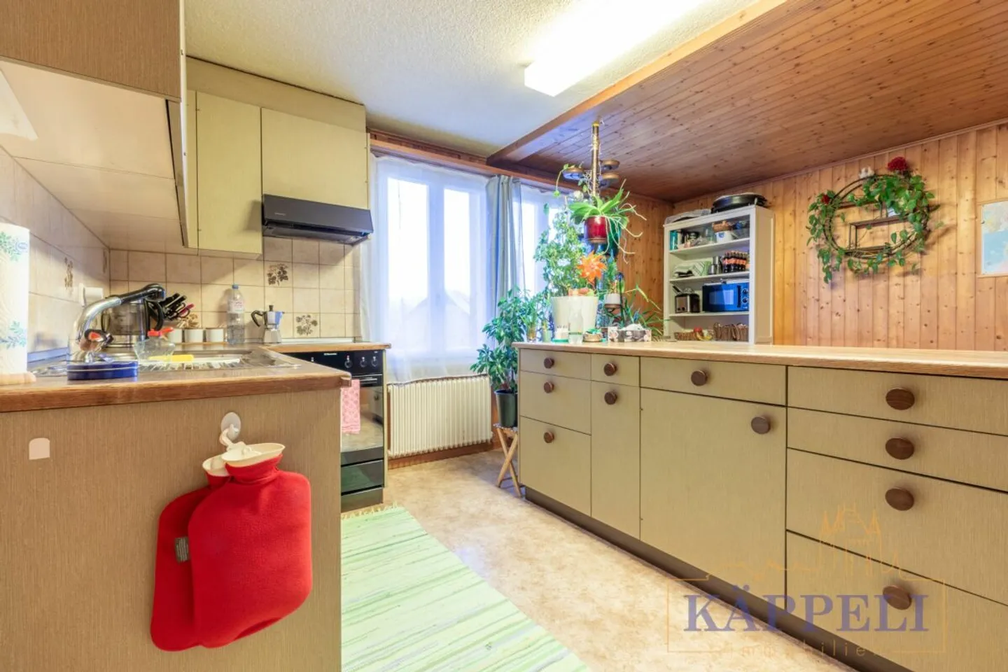 Charming and well-maintained two-family house in a central location in rural Uebeschi - Photo 1 of 13