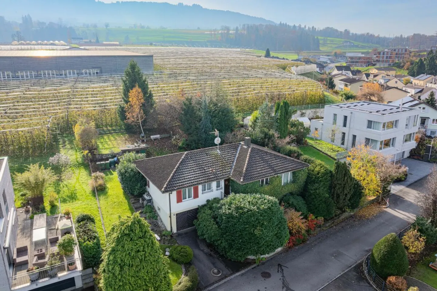 Entwicklungsareal mit Bestandesobjekt mit Seesicht - Foto 2 von 7