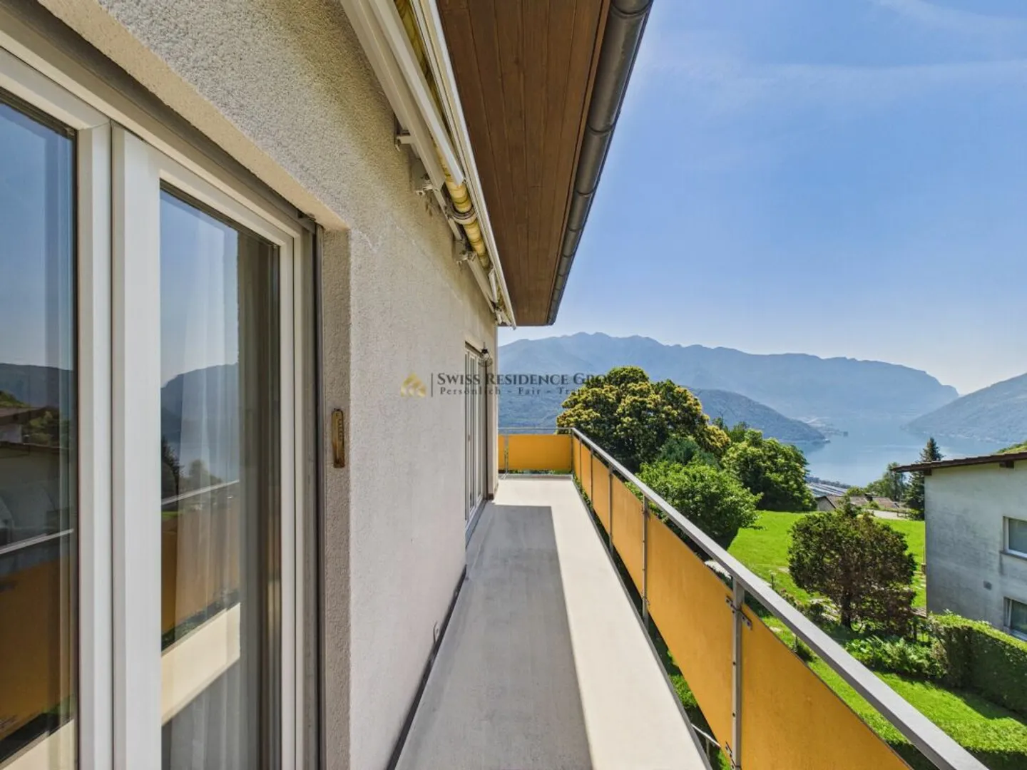 Elegant penthouse apartment with breathtaking views of Lake Lugano - Photo 1 of 12