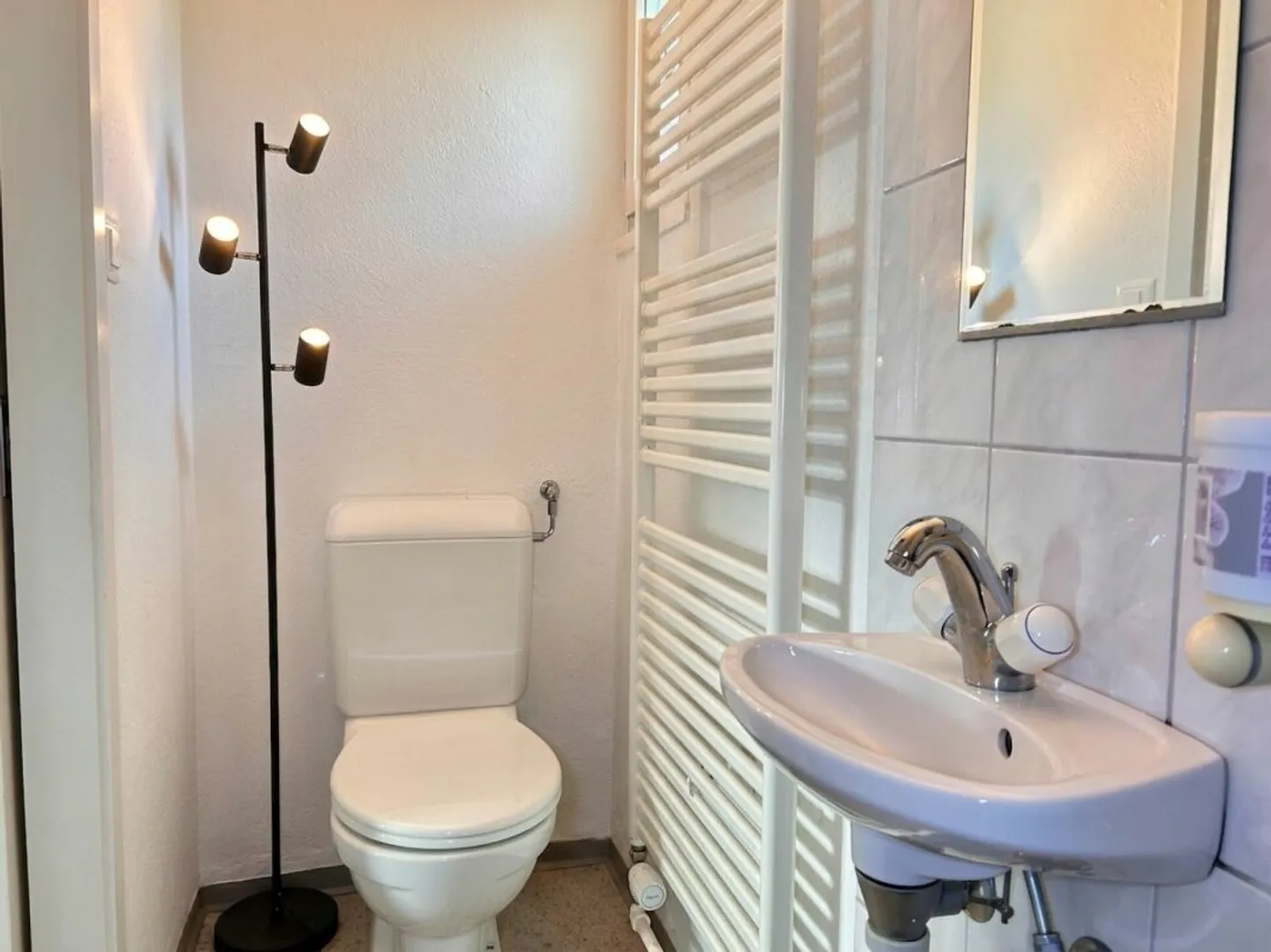 Row House in Sunny Hillside Location with Garage - Photo 10 of 13