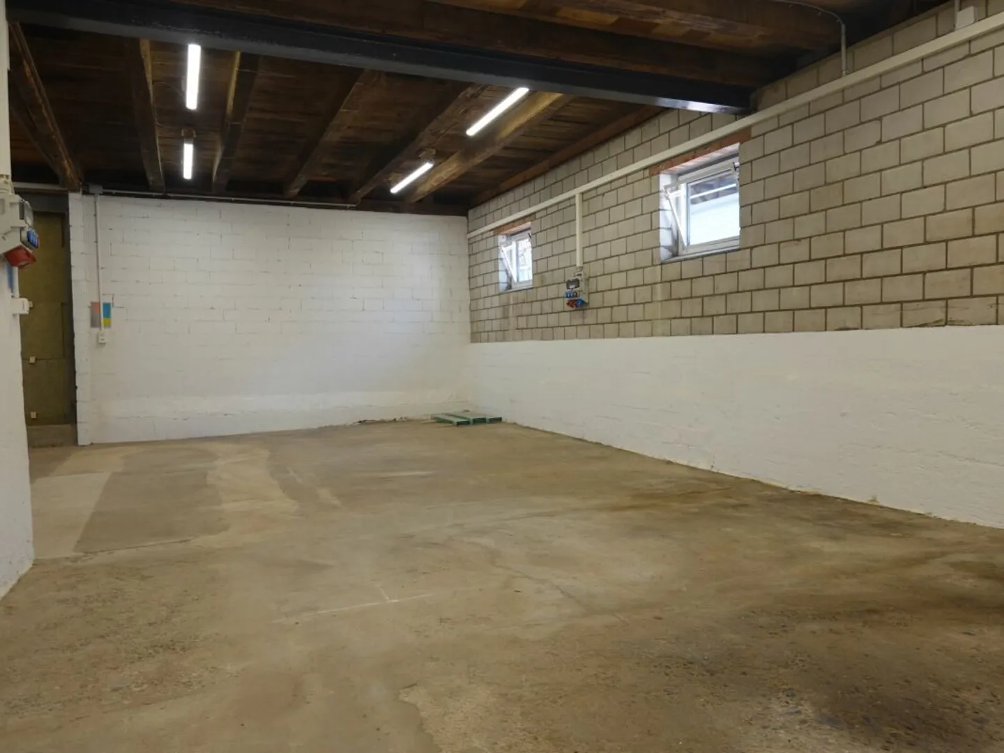 Ground-level, bright, practical commercial or storage space - Photo 3 of 3