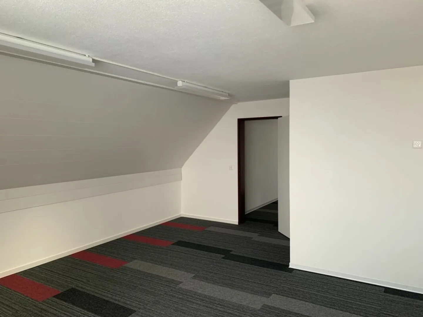 Gewerbefläche zur Miete im Zentrum von Saignelégier - Foto 1 von 4