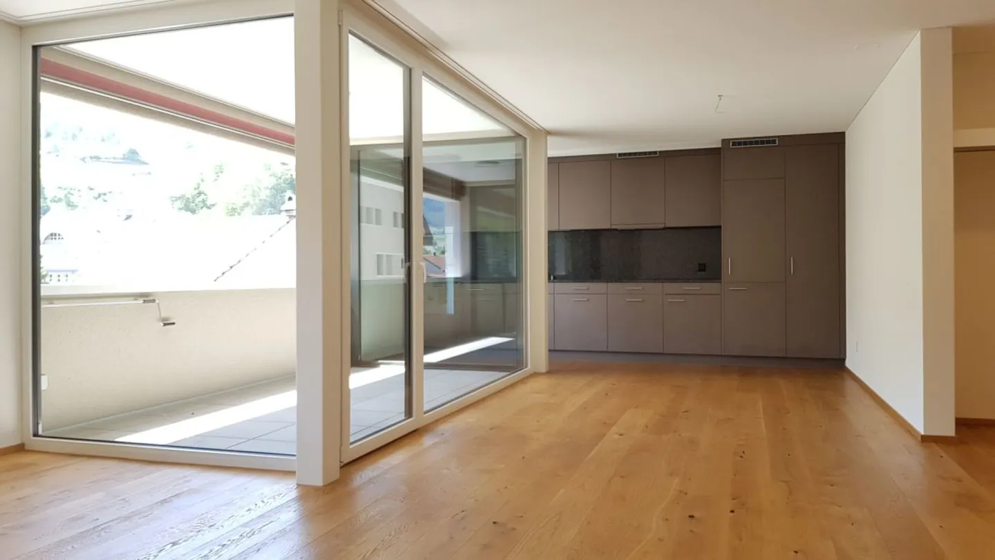 neuwertige 3 1/2-Zimmer-Wohnung mit zentraler Lage - Foto 1 von 9