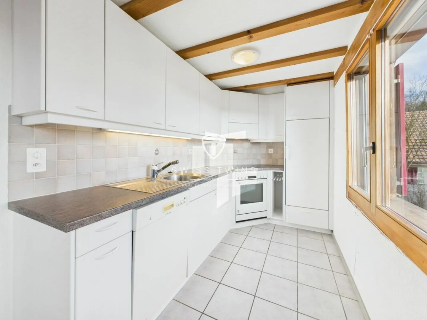 Charmante 2.5-Zimmer-Maisonettewohnung in ruhiger, grüner Umgebung - Foto 2 von 11