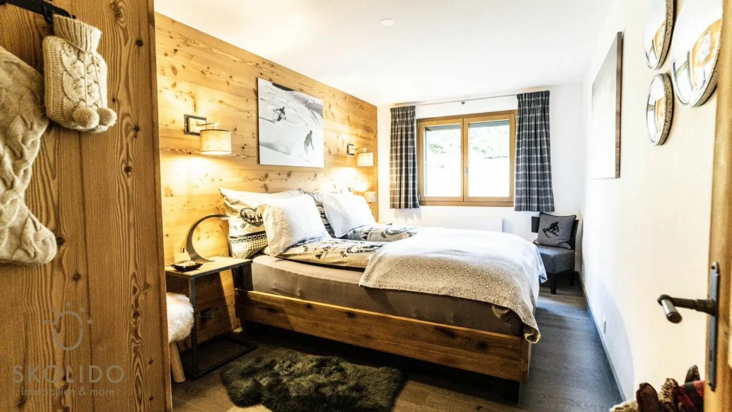 Appartamento ristrutturato di alta qualità nel fascino alpino in una posizione centrale - Foto 9 di 13