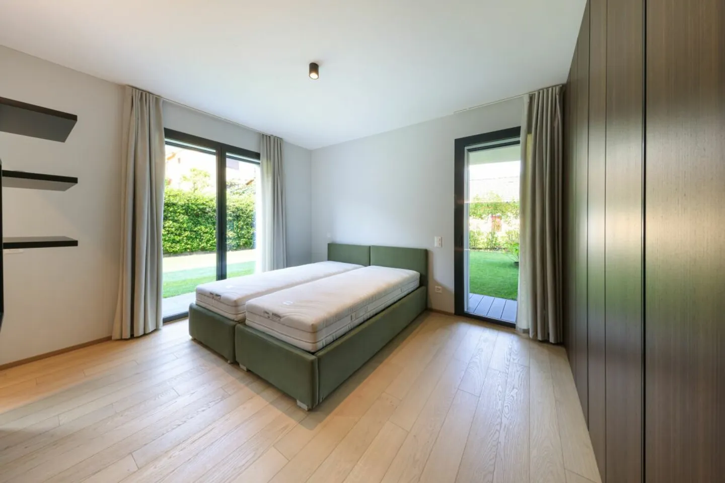 MINUSIO - Moderne 3.5 Zimmer-Wohnung mit privatem Garten - Foto 10 von 13