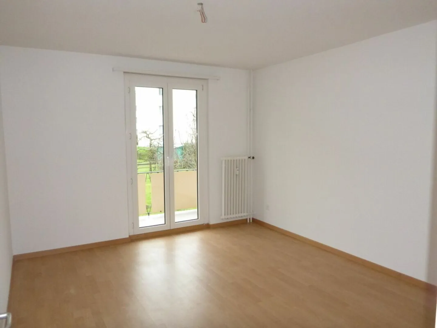 Appartement lumineux avec balcon et coin jardin privé - Photo 3 sur 10
