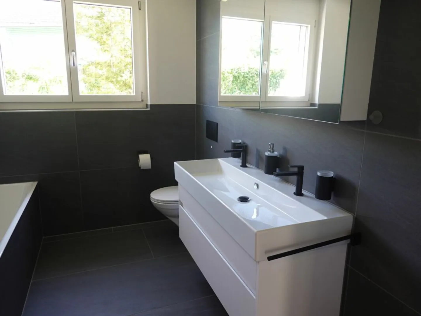 Moderne 4.5-Zimmer-Gartenwohnung im Herzen von Kleinandelfingen - Photo 5 of 7