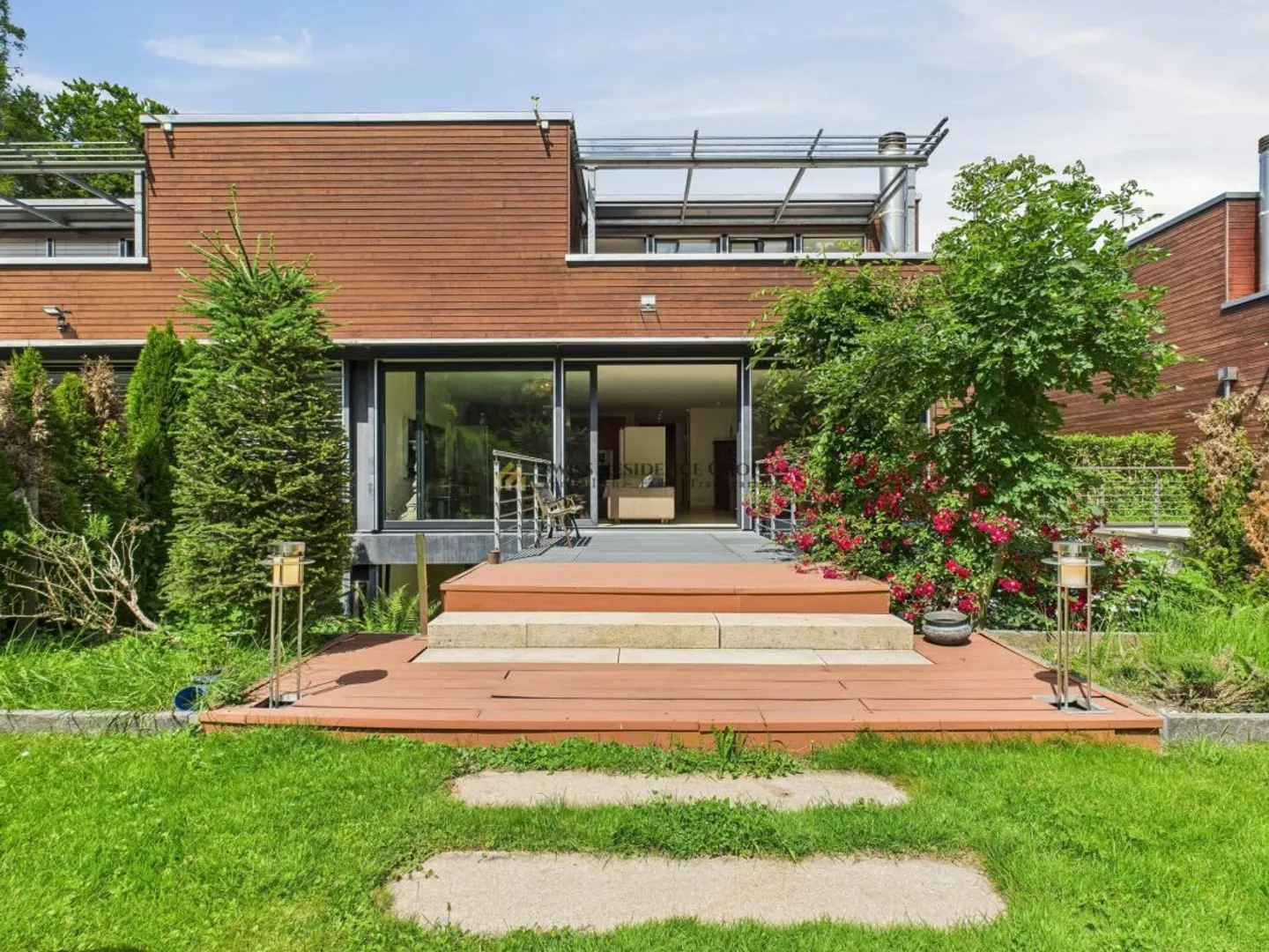 Duplex exclusif avec jardin - Photo 2 sur 13