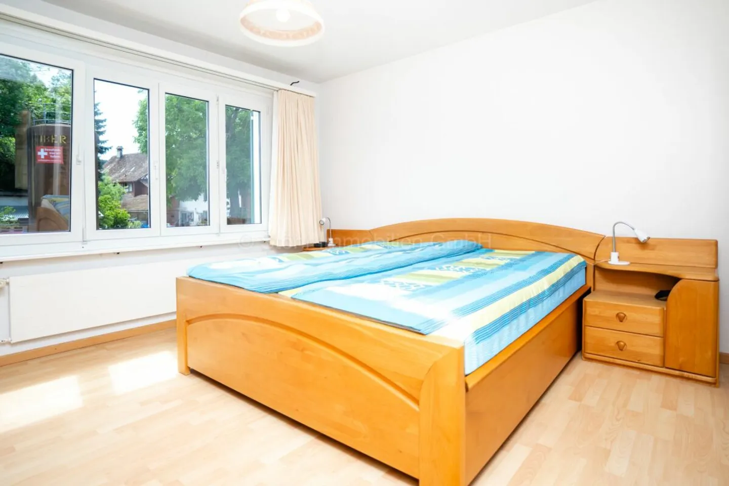 Appartamento 3.5 locali al piano rialzato con balcone e locali accessori versatili - Foto 9 di 13