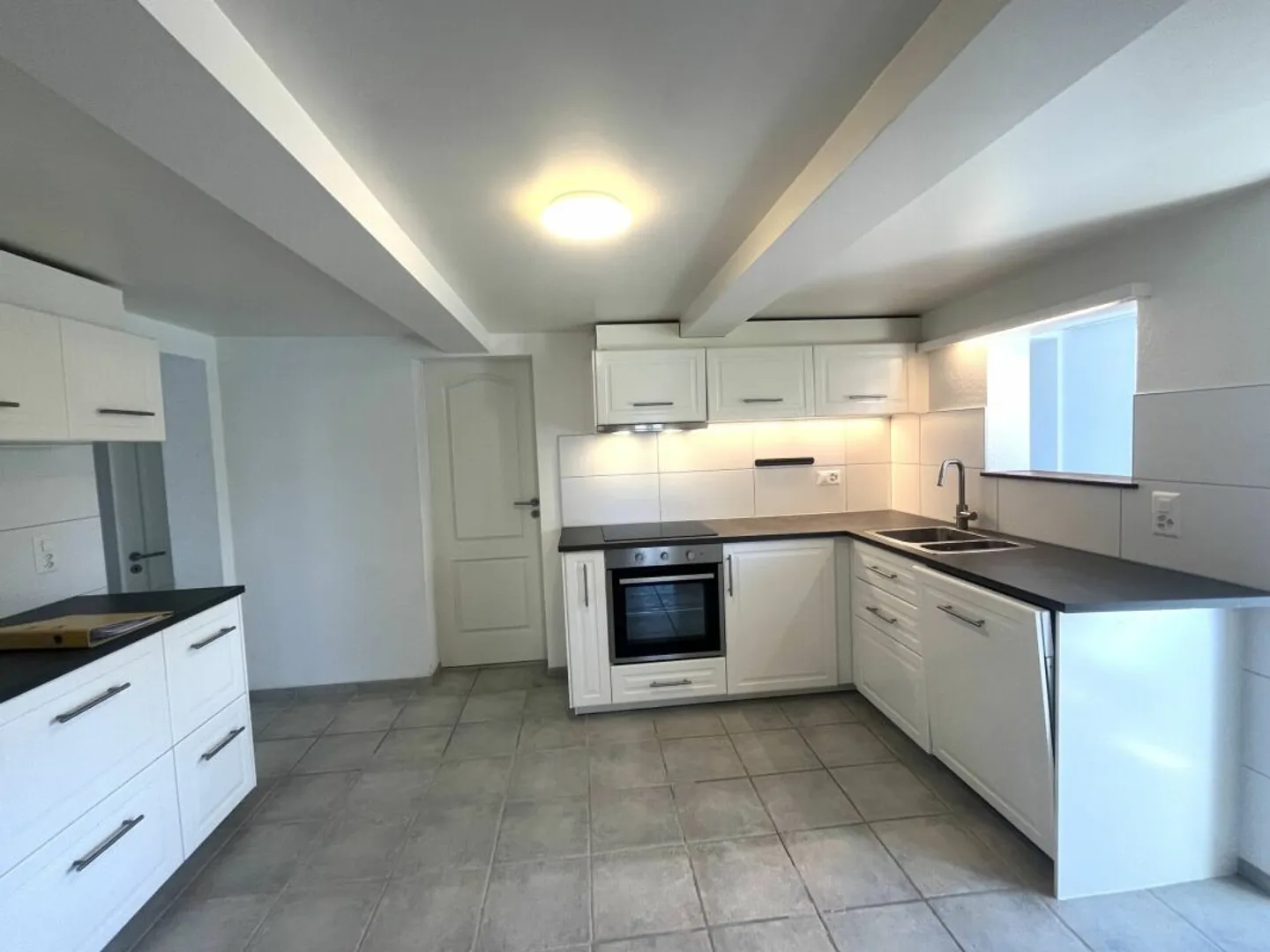 Appartement Rénové au Village - Photo 1 sur 9