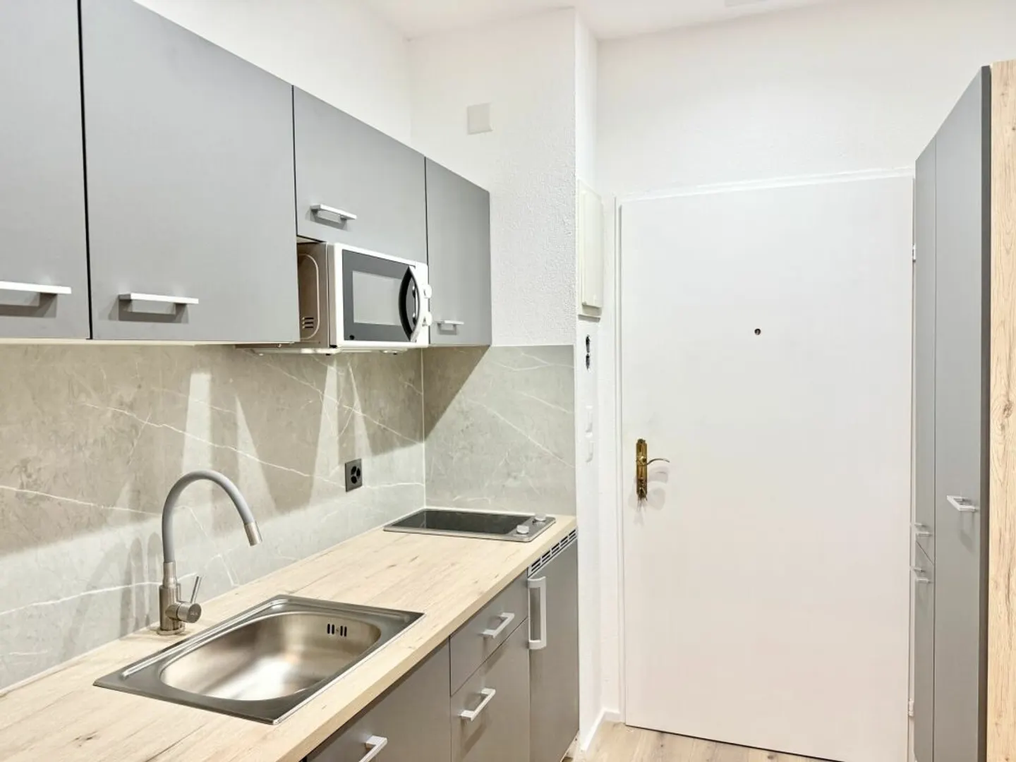Appartamento 1.5 stanze completamente ristrutturato e modernizzato con stile al confine della foresta - come investimento - Foto 8 di 13