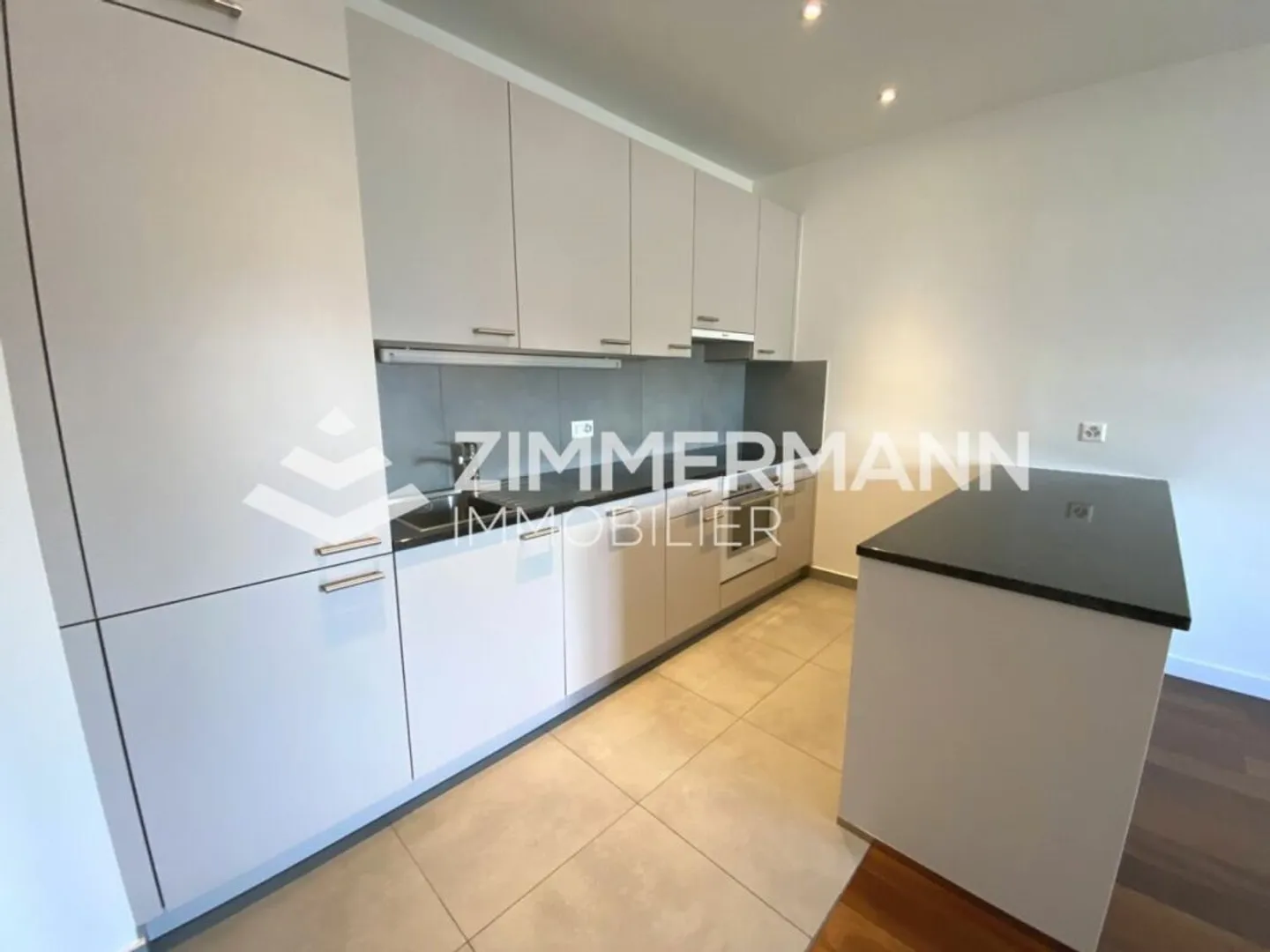 Charmant appartement 2.5 pièces - Photo 2 sur 5