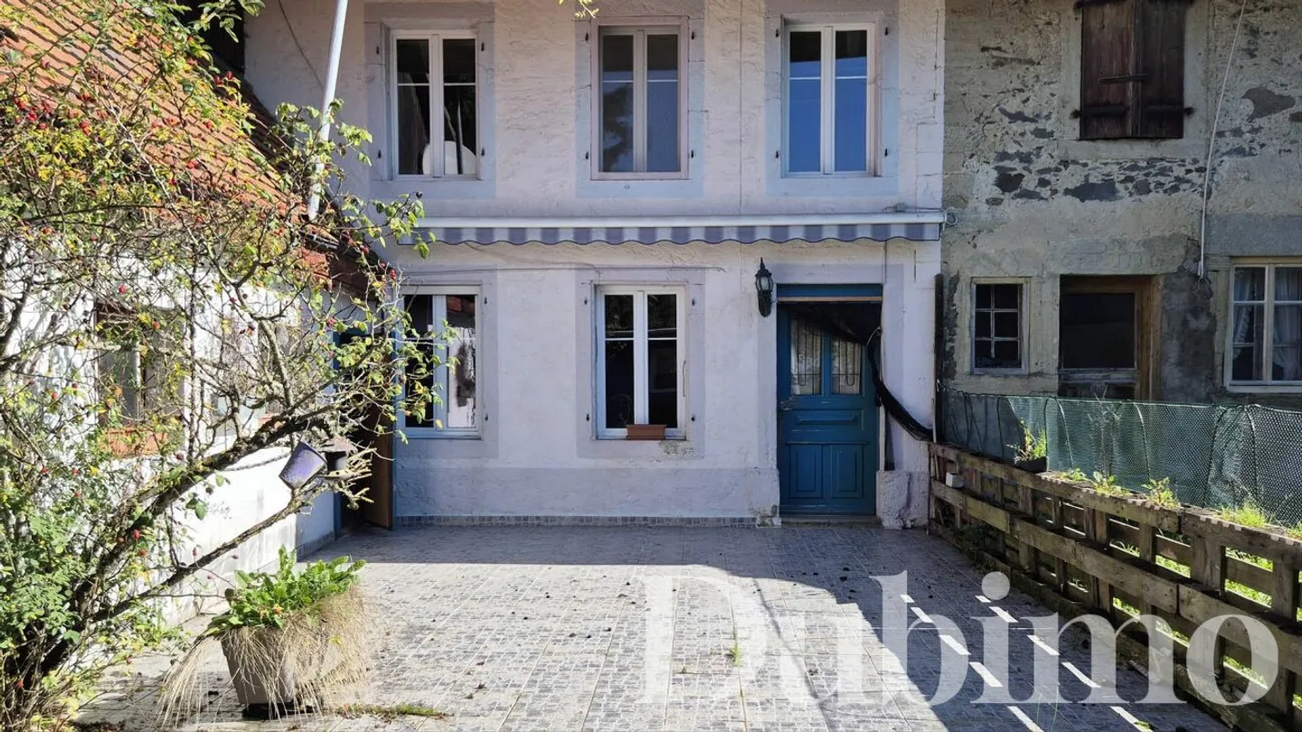 Charming Village House with Potential - Photo 2 of 13