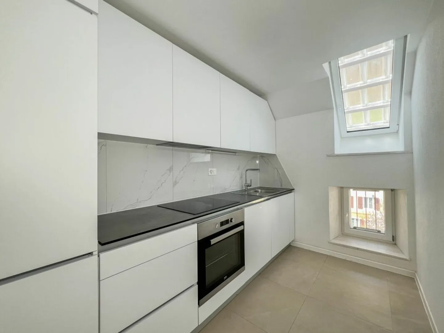 Charmant duplex de 4 pièces entièrement rénové pour du rendement - Foto 3 von 13