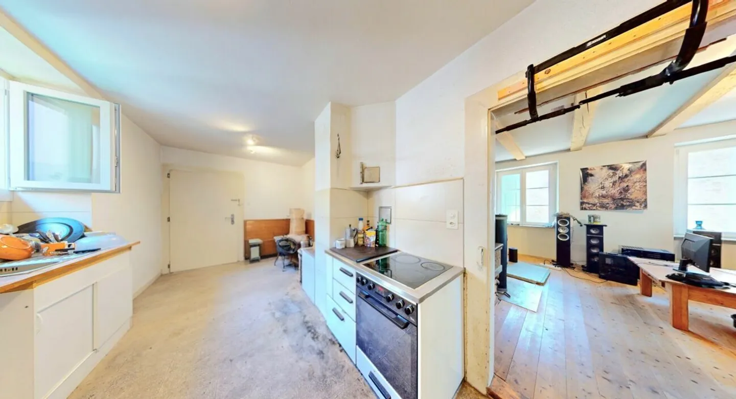 Une maison avec une histoire ! Ferme avec grange, charme et énorme potentiel - Photo 5 sur 13