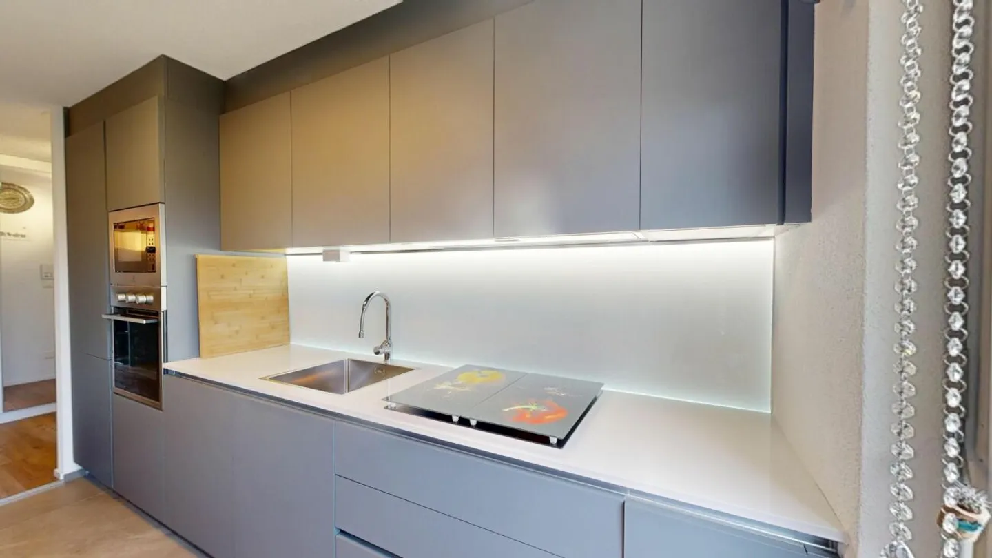 Appartamento attraente di 4,5 stanze con balcone e garage sotterraneo - Foto 4 di 13