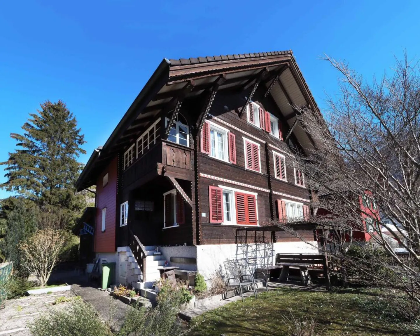 Maison jumelée de style chalet avec jardin - Photo 1 sur 13