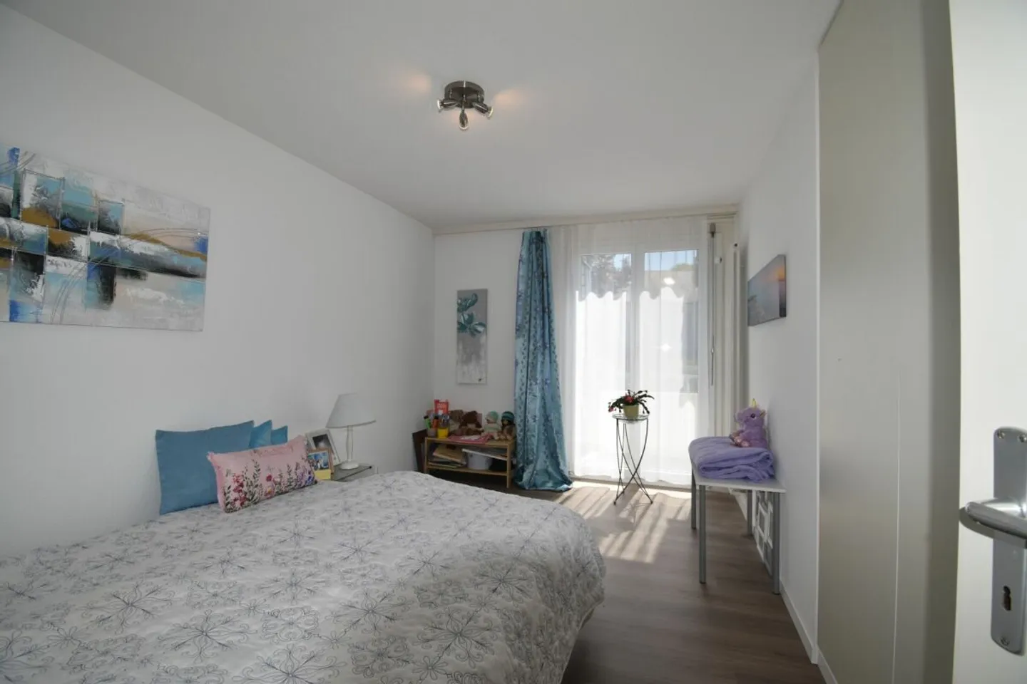 Modern Row House with Community Pool - Photo 11 of 13