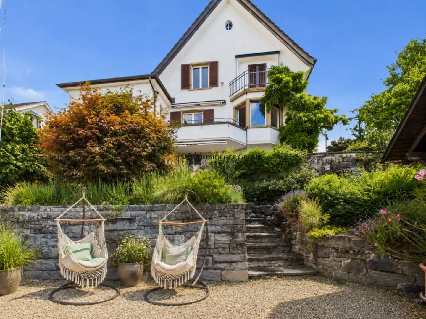 Maison individuelle charmante avec terrasses de jardin et vue imprenable sur le lac - Photo 3 sur 13