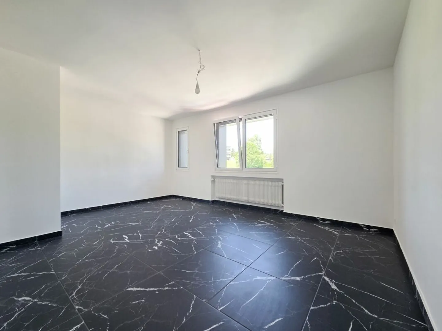 Appartement rénové 4.5 pièces - Photo 3 sur 10