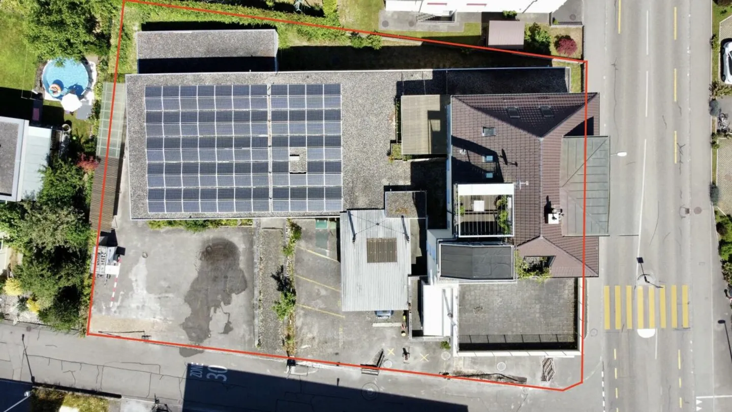 Multi-family house with commercial share and PV system in the core zone - Photo 8 of 13