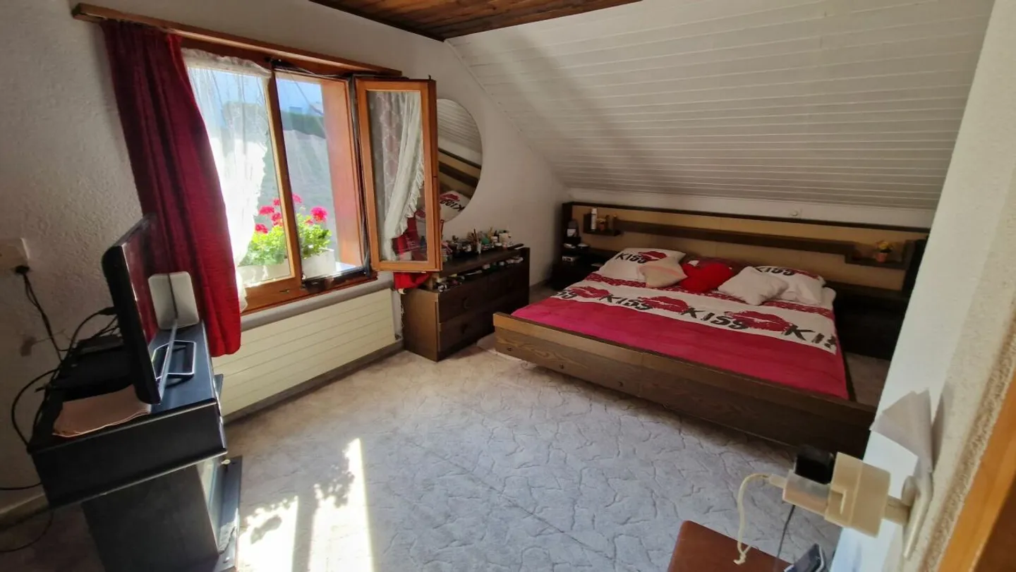 Une maison avec une histoire - et un terrain avec un avenir - Photo 8 sur 13
