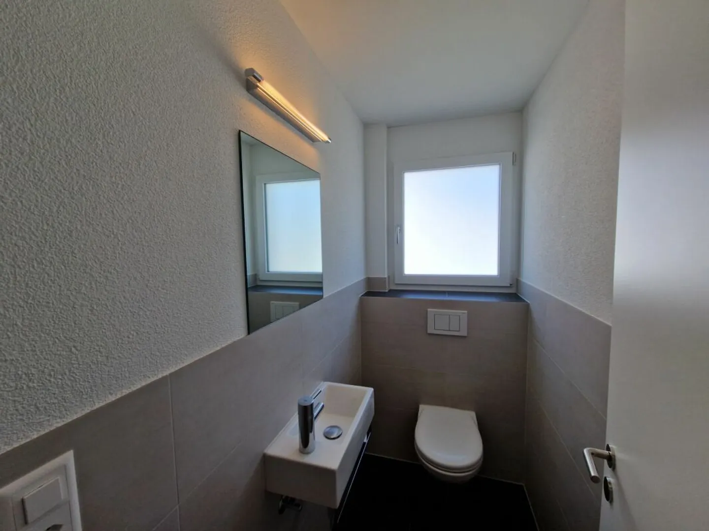 Moderne Wohnung mit sonniger Terrasse - Foto 9 von 11