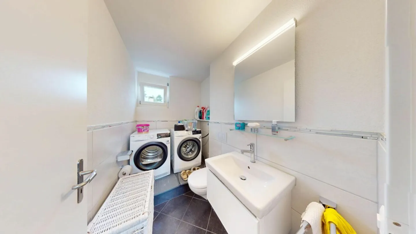 Exclusive living experience on two levels with high-quality standard of construction - Photo 8 of 13