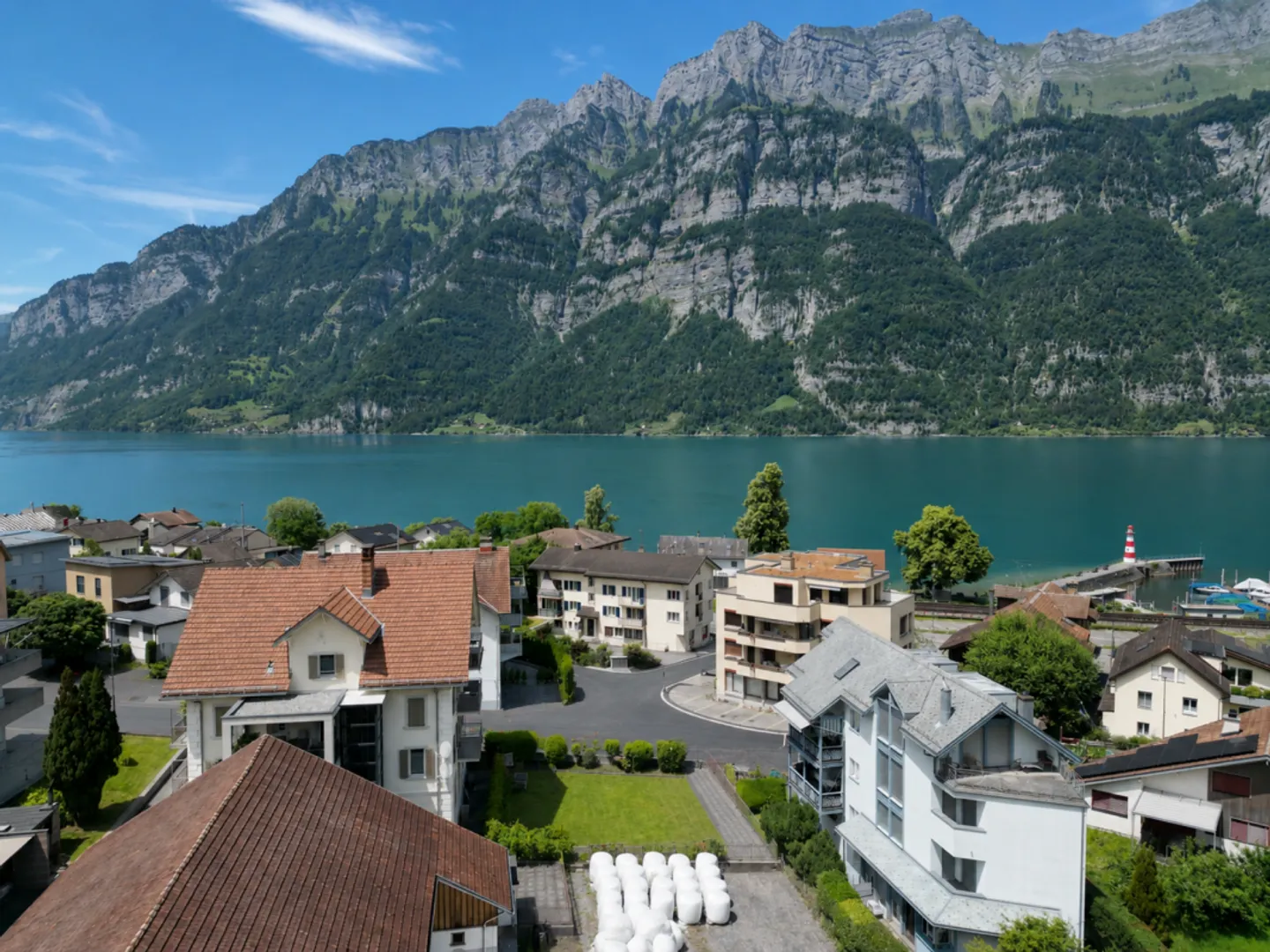 Casa plurifamiliare con 4 unità abitative e un locale commerciale a Unterterzen SG - Foto 7 di 13