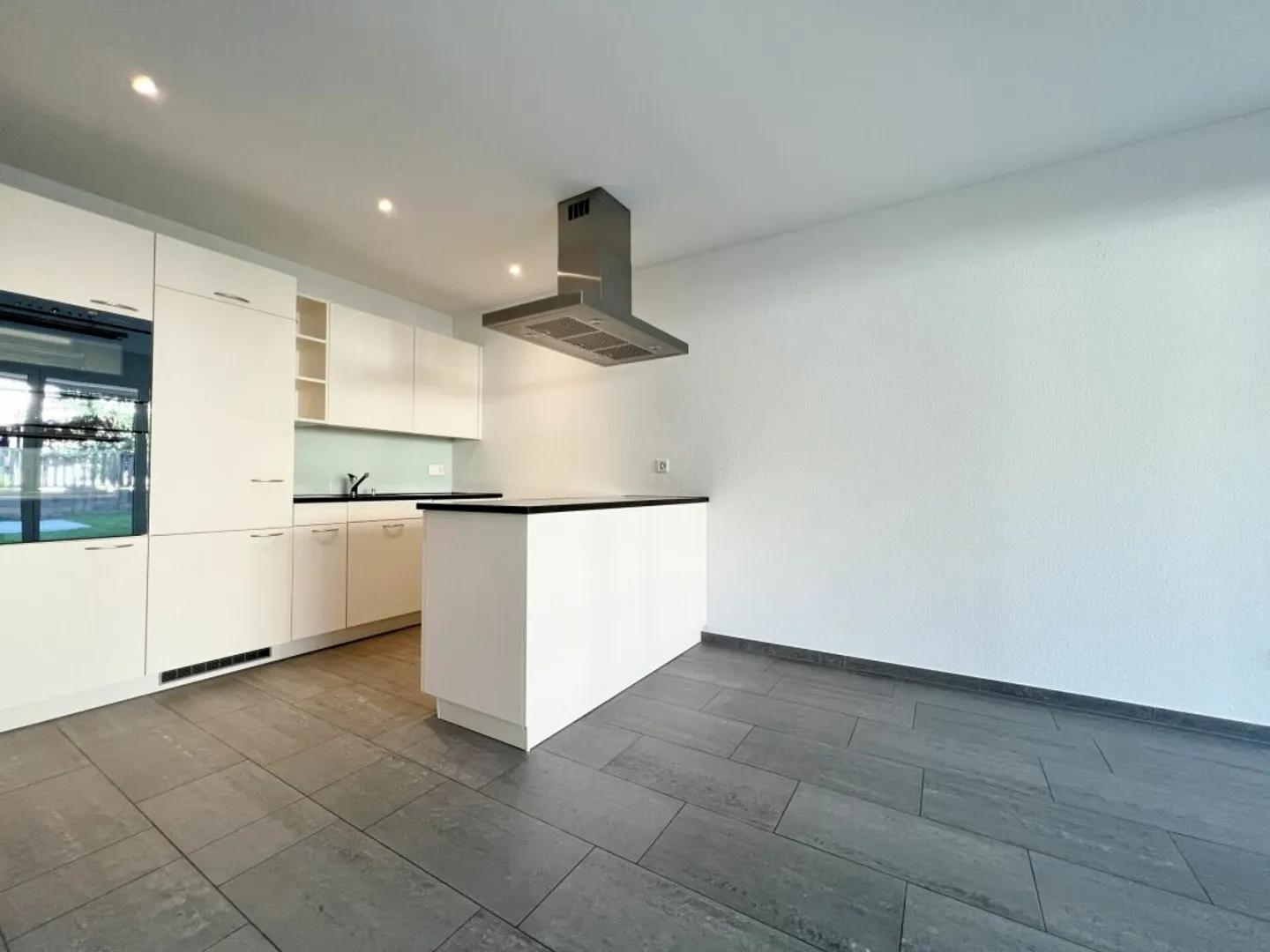 Charmant Appartement avec Jardin à Birrhard - Photo 8 sur 13