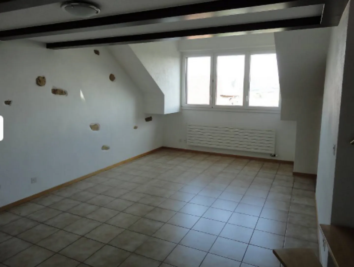 Charmante 2-Zimmer-Dachgeschosswohnung mit Mezzanin - Foto 2 von 5