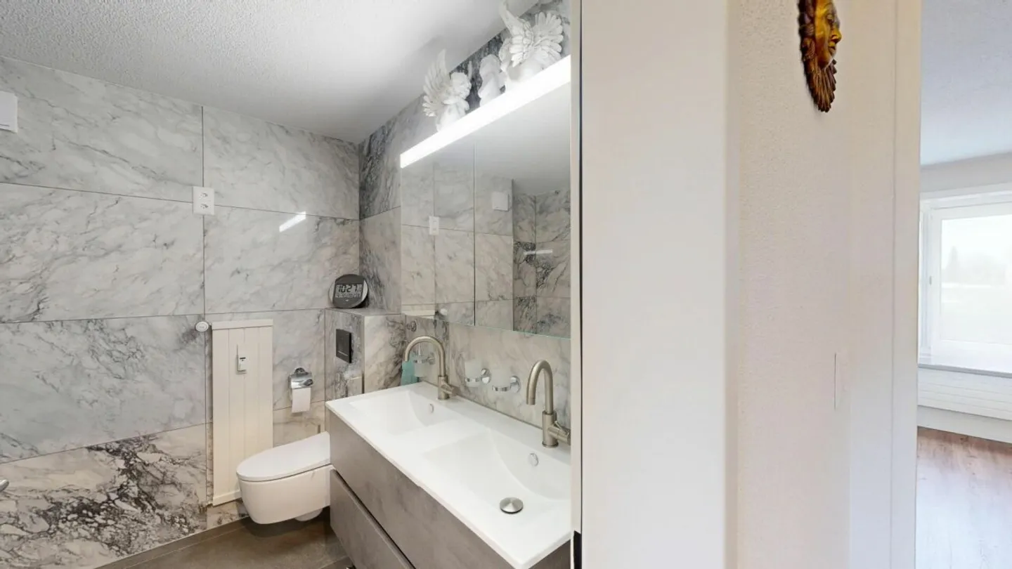 Appartamento attraente di 4,5 stanze con balcone e garage sotterraneo - Foto 10 di 13