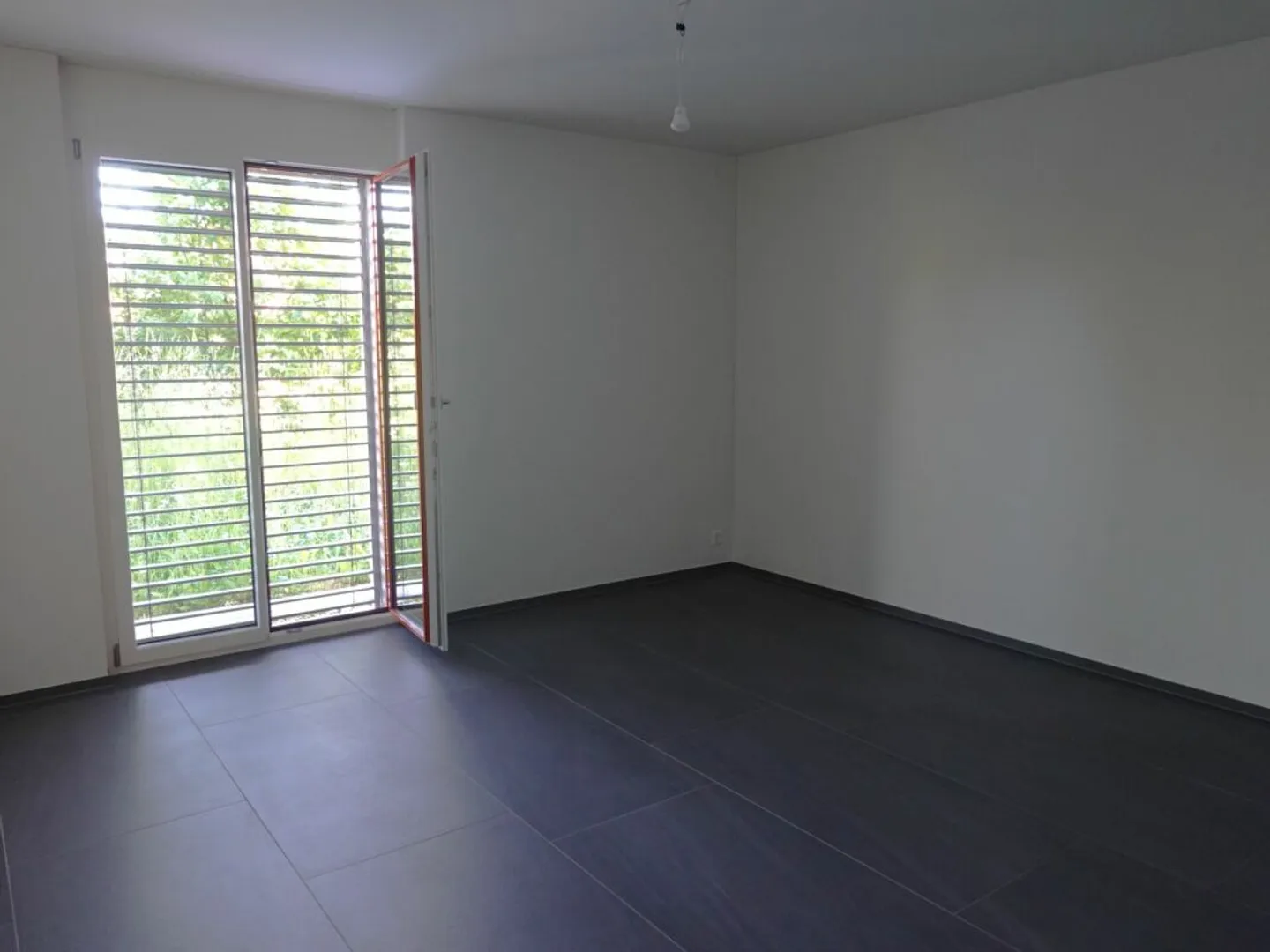 Moderne 4.5-Zimmer-Gartenwohnung im Herzen von Kleinandelfingen - Photo 6 of 7
