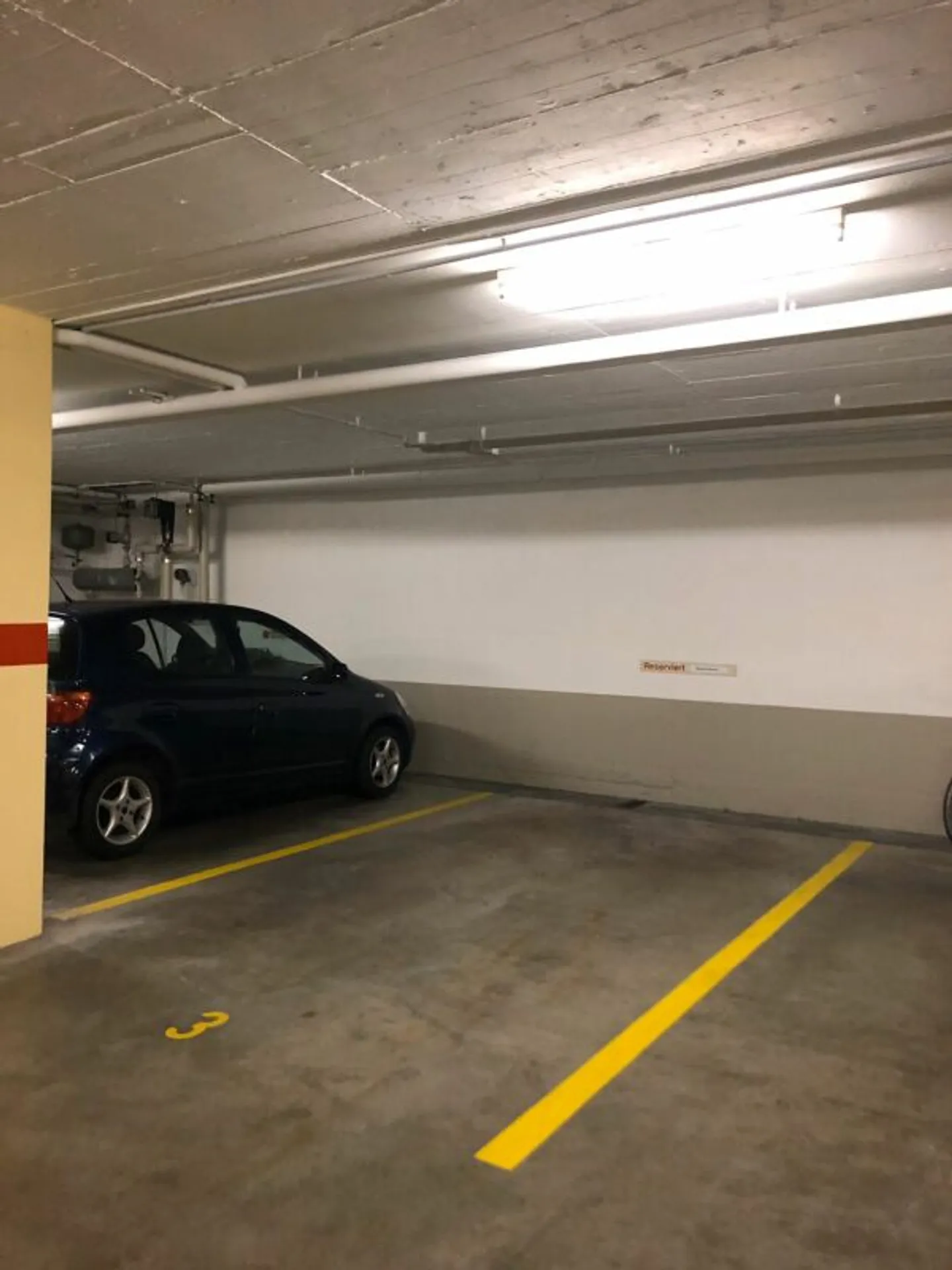 Underground parking space for rent on Bahnhofstrasse - Photo 2 of 3