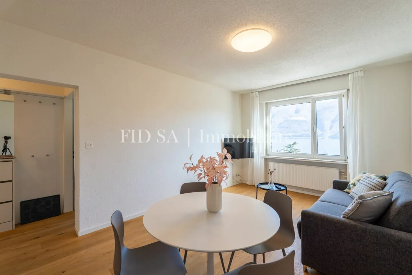 Charmante Wohnung mit Seesicht - Foto 3 von 7